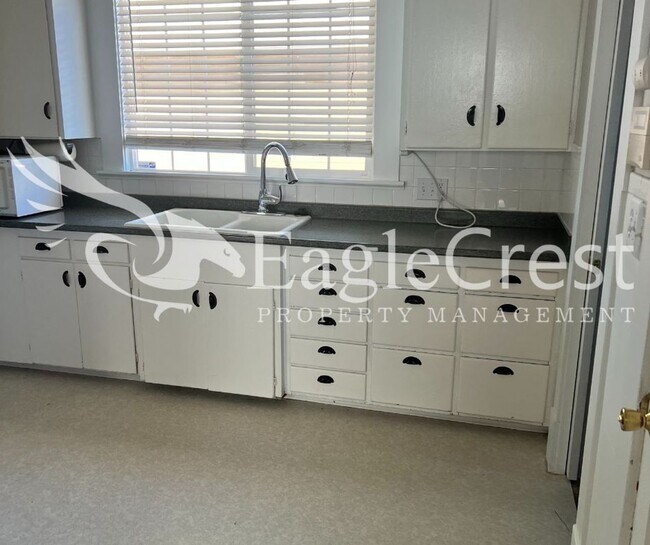 Photo - Charming 3BR Home with Spacious Yard & Bonus Living Space