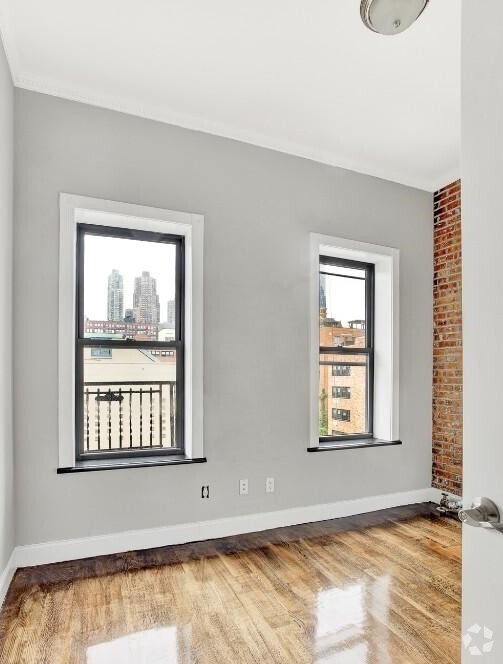 Building Photo - 438 W 52nd St Unit 13E Rental