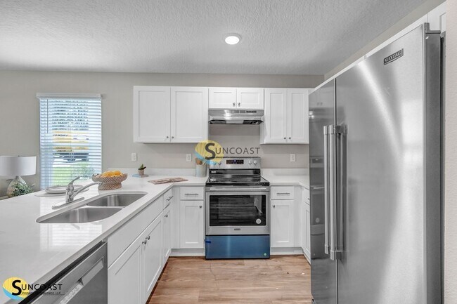 Building Photo - 6499 Breezy Oaks Wy Unit 102