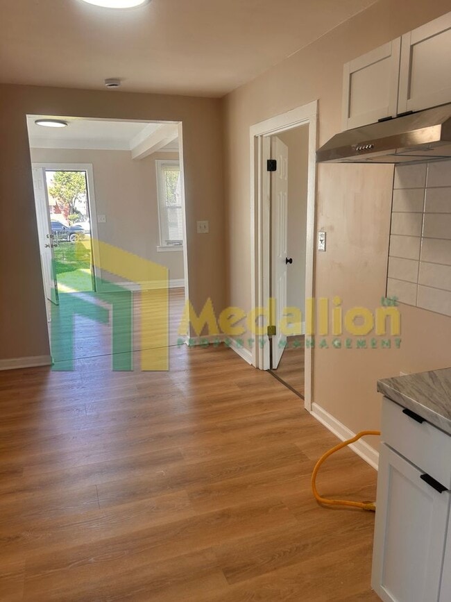 Photo - Spacious 1-Bedroom Single-Family Home with Large Fenced Yard
