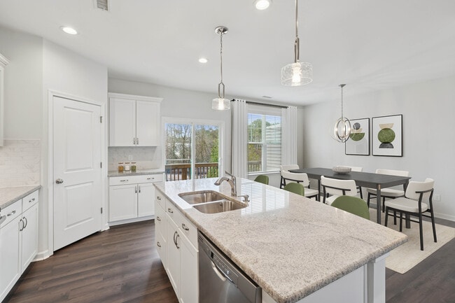 Upgrade Package Kitchen and dining area with hard-surface vinyl plank flooring