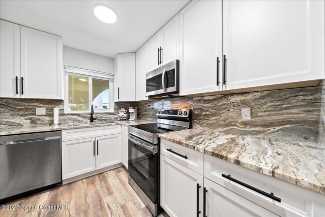 Photo - 201 St Lucie Ln Unit 608