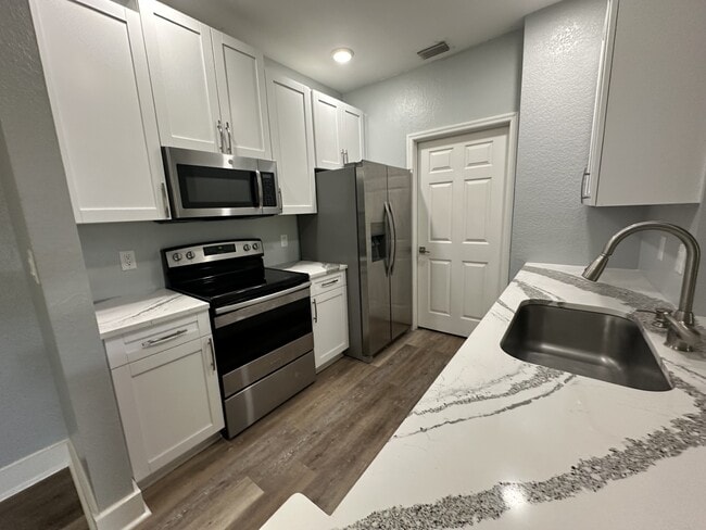Photo - 10123 Courtney Palms Blvd Unit 10123 Courtney Palms