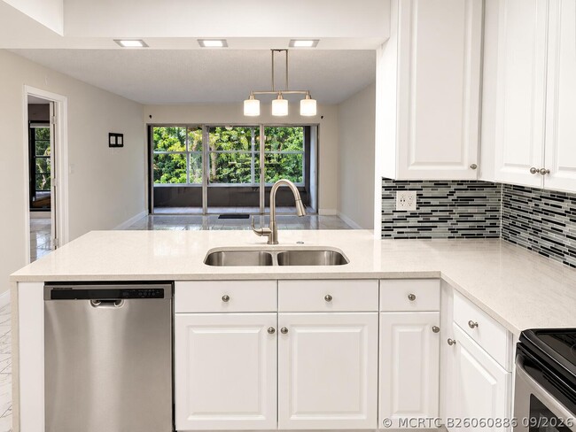 Building Photo - 8301 Sands Point Blvd Unit S306