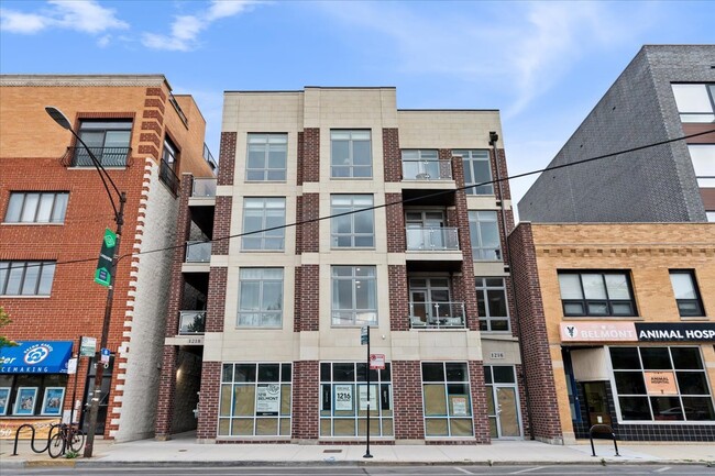 Building Photo - 1218 W Belmont Ave Unit 201