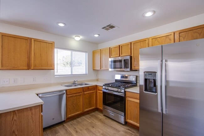 Photo - Lovely 4 bedroom 2.5 bath townhome in North Las Vegas gated community with a pool!