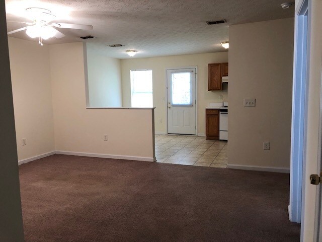 Building Photo - 209 E Wilson St Unit 128