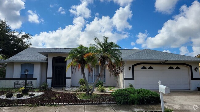 Building Photo - PENDING LEASE-Annual unfurnished 4/2 SFH i... Rental