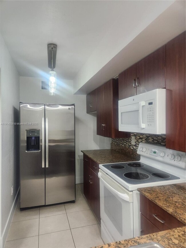 Photo - 18880 NW 57th Ave Unit 105