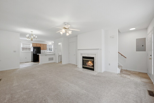 2BR/2.5BA & 3BR/3.5 BA - Living Room with Fireplace - LIMESTONE PLACE