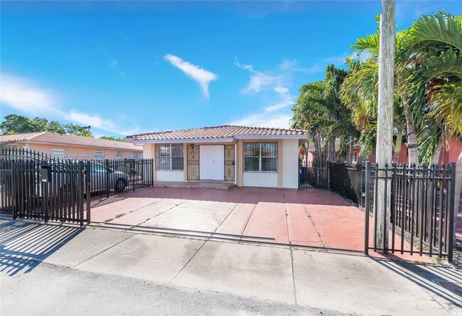 Building Photo - 3076 SW 17th St Unit Front