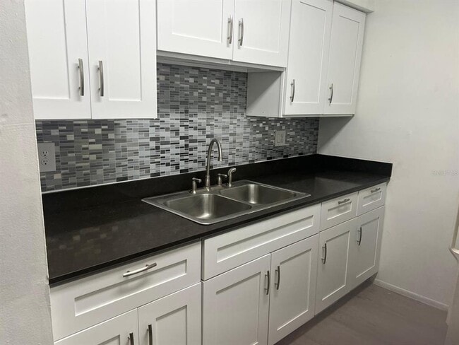 Building Photo - 6130 Curry Ford Rd Unit 257