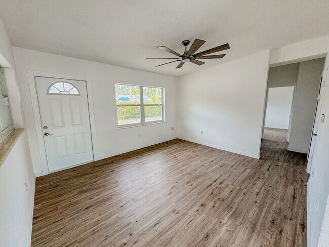 Photo - Large fenced yard! Central location!