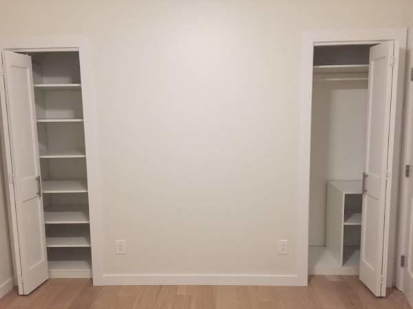 Closet organizers in bedroom - 151 Sylvan Ave Unit B