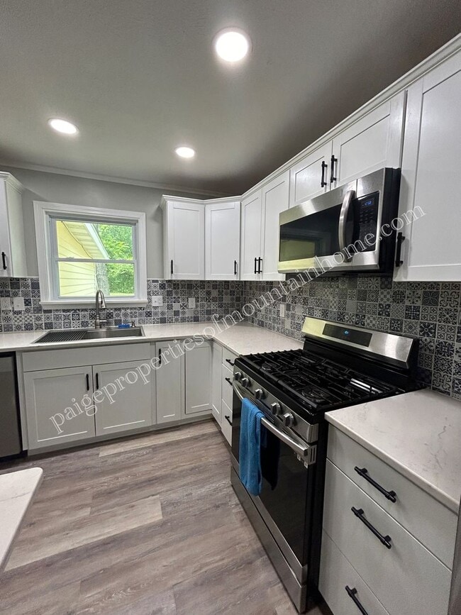 Photo - Stunning 4-bedroom, 2-bath Home with Attached Garage