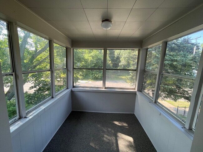 Photo - Upper Duplex large rooms and 3 season porch