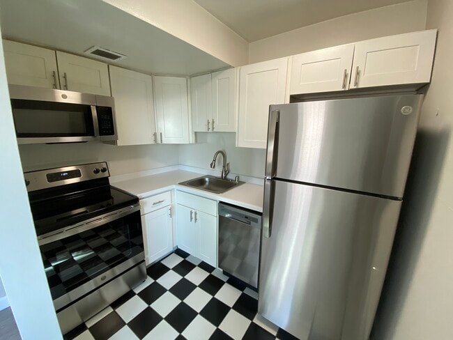 Updated Kitchens - The Empire Building Apartments