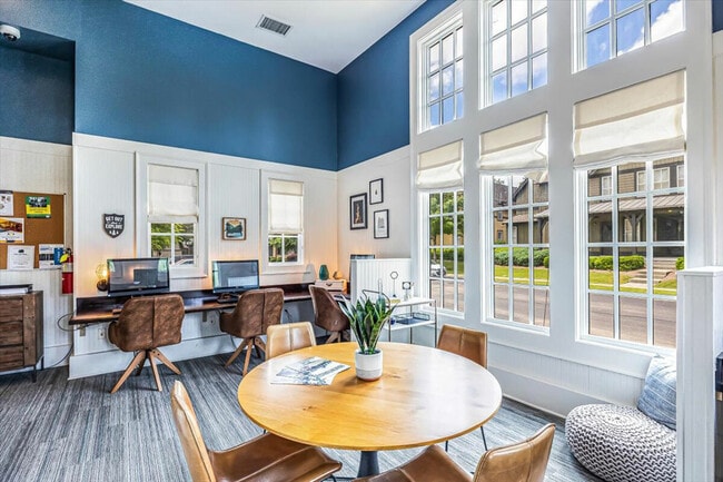 Study and collaborate in the cozy community workspace at The Cottages of Hattiesburg.