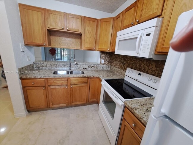 Building Photo - 3410 Foxcroft Rd Unit 104 Rental