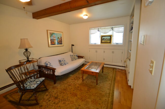 Living area with built-in shelves - 28 Merton Rd Unit Rear