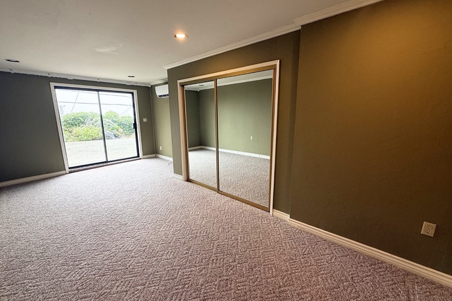 Photo - Spacious 1-Bedroom Lower-Level Apartment with Private Patio