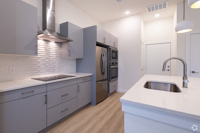 1 habitación, 1,5 baños - 812 pies cuadrados - Cocina - Oasis at Woodland