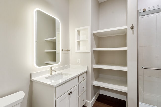 Bathroom with built in shelves