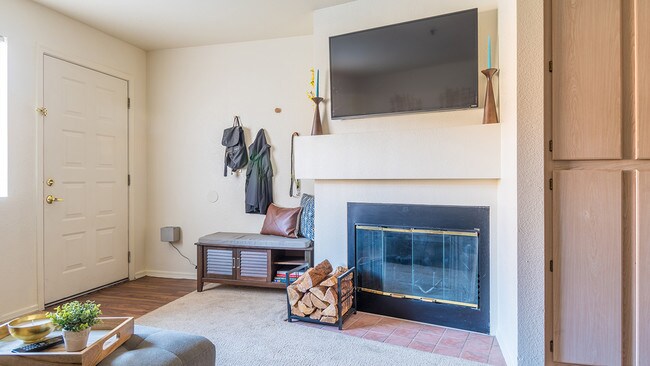 Living room with fireplace - Villas at Montebella