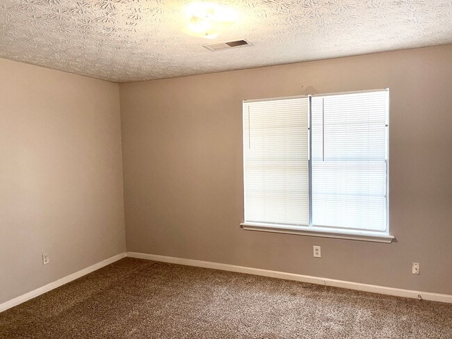 Photo - Welcome to this charming 2-bedroom, 2-bathroom townhouse located in the heart of Fayetteville, GA.