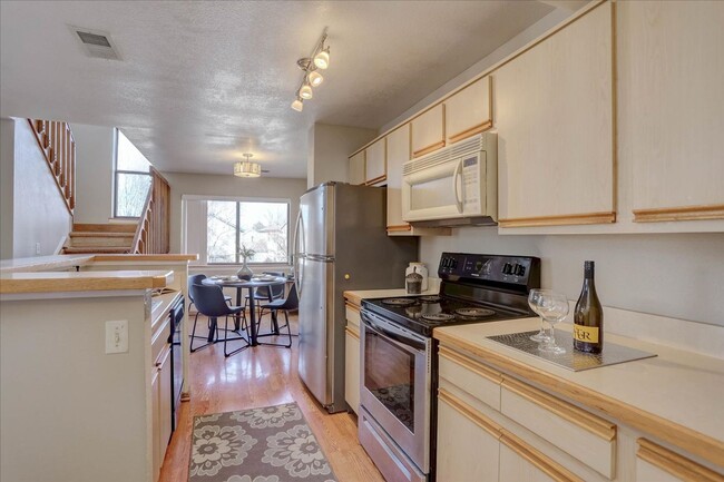 Photo - 2-Story Condo, Wood Flrs Wood FP Unit 91