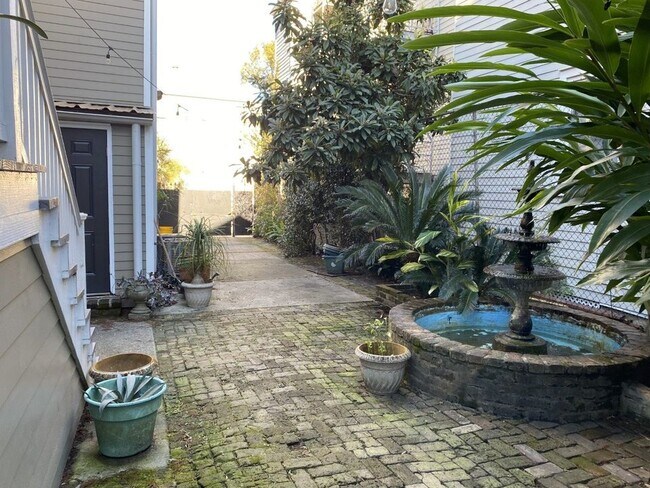 Beautiful courtyard with fountain - 1300 Treme St Apartments Unit B