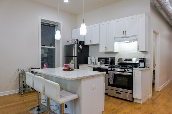Apt 2 (3bd/2ba) - Open Living Room / Kitchen - Harris Point Chicago
