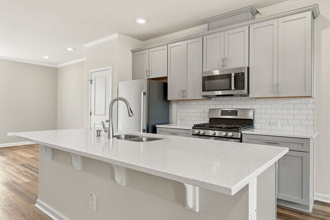 Photo - **Applications Pending** Light-Filled Townhome | Private Baths + Prime Raleigh Location