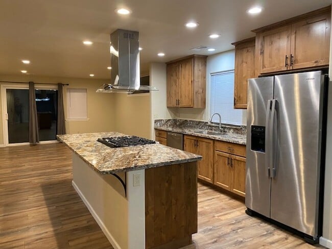 Building Photo - Simply gorgeous 3/2 with 2 car garage, dog...