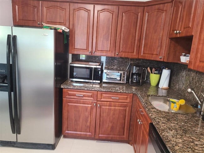 Building Photo - 3091 N Course Dr Unit 208