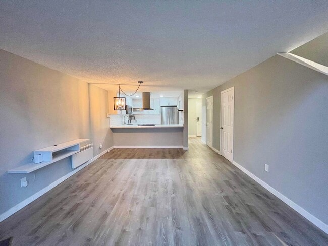 Photo - Charming 2-Bedroom Tukwila Townhome with Garage, Parking, Stainless Steel Appliances & Fireplace ...