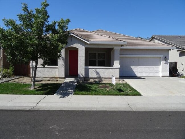 Building Photo - Charming 5 bedroom 2.5 bathroom home located in Natomas!
