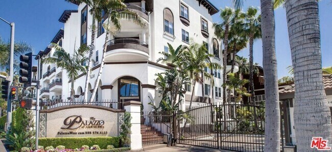Building Photo - 6220 W 3rd St Unit Apt 414