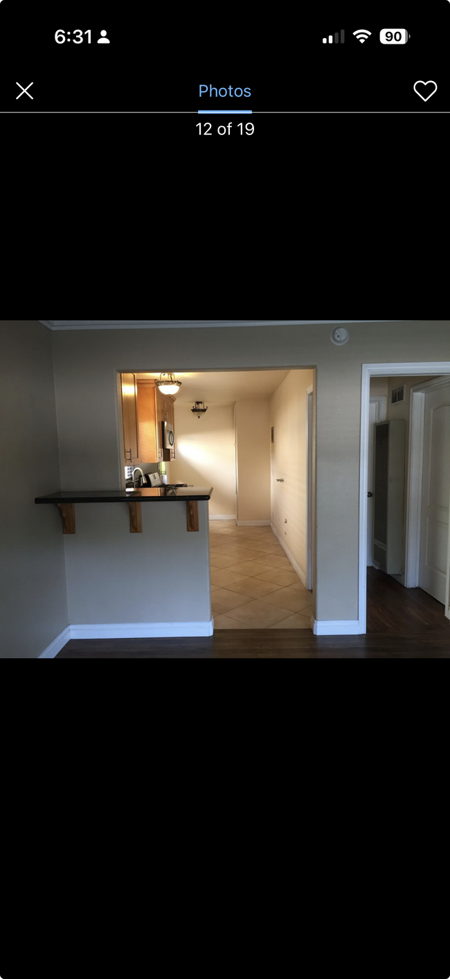 View from dining area to kitchen. - 1308 N Hollywood Way Unit Apartment A