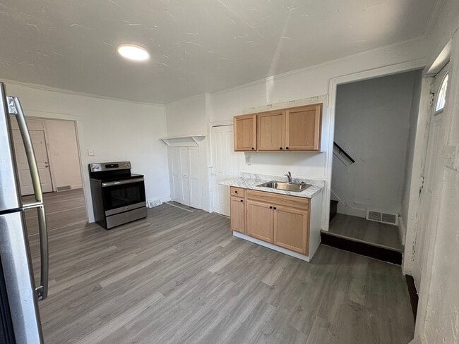 Building Photo - Newly Renovated Three-Bedroom, One Bathroom Row Home