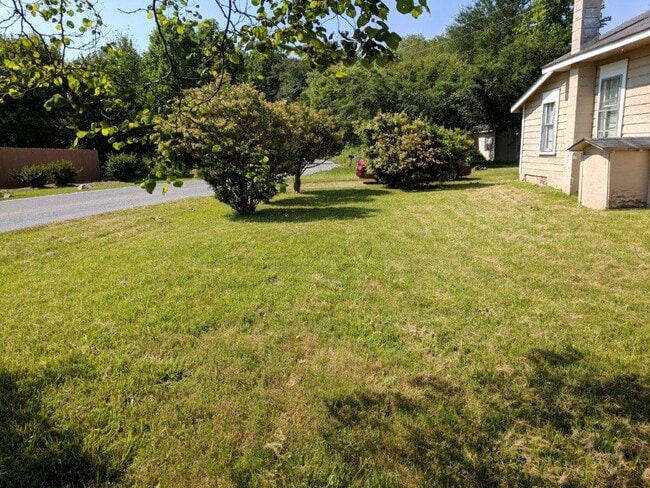 Photo - 2BR Home with Water, Sewer & Lawn Care Included + Covered Porch