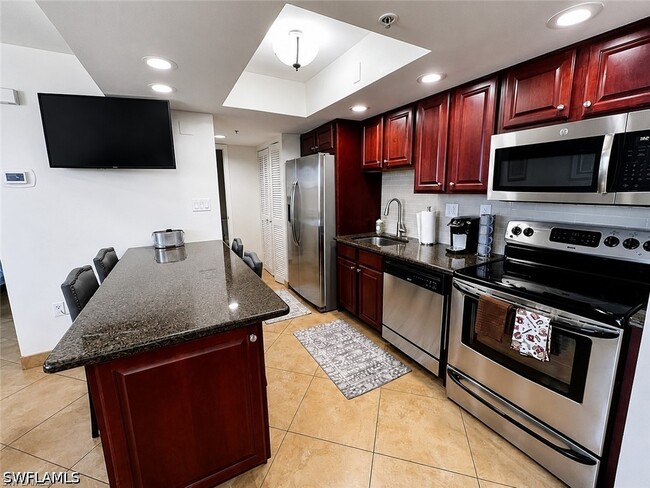 Building Photo - 7390 Estero Blvd Unit 203B