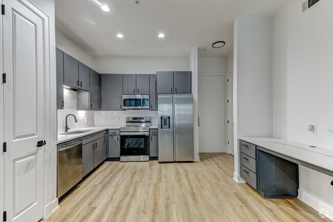 1 habitación, 1 baño - 745 pies cuadrados - Cocina - Domain on the Parkway