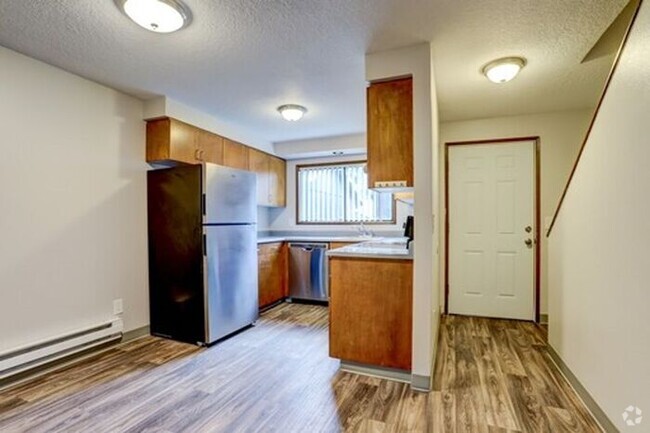 Building Photo - 2 bedroom 1.5 bath. Garage available!! App... Rental