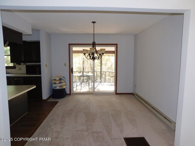 Photo - 3-bedroom, 2-bath home featuring an open f...
