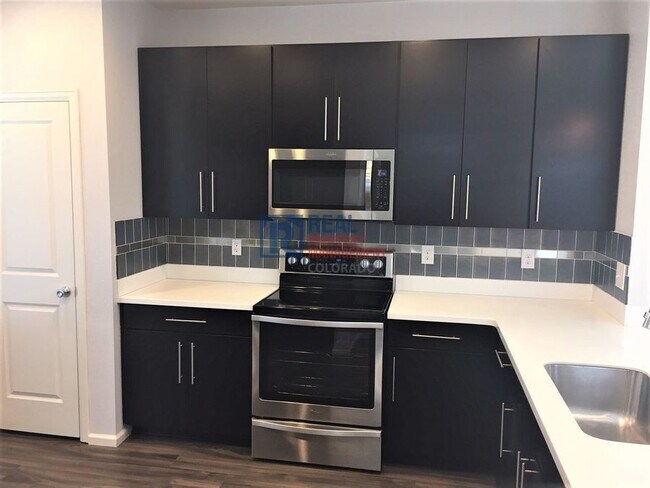 Photo - 9449 E 52nd Ave