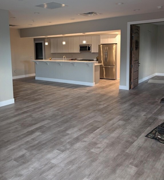 Unidad 3 Cocina-Sala de estar - Northwood Patio Homes