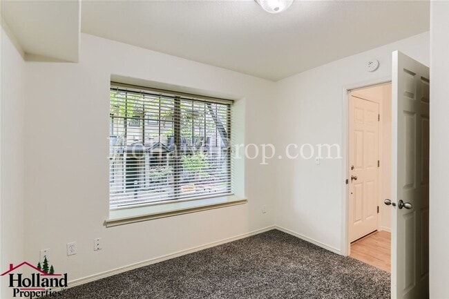 Photo - Modern 2-Bedroom Townhome with Garage & Private Deck