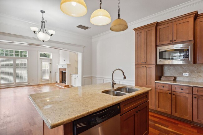 Photo - Morning coffee, evening dinners, weekend strolls—life here is wonderfully walkable.