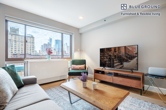 Photo - 311 W 50th St Unidad FL5-ID213